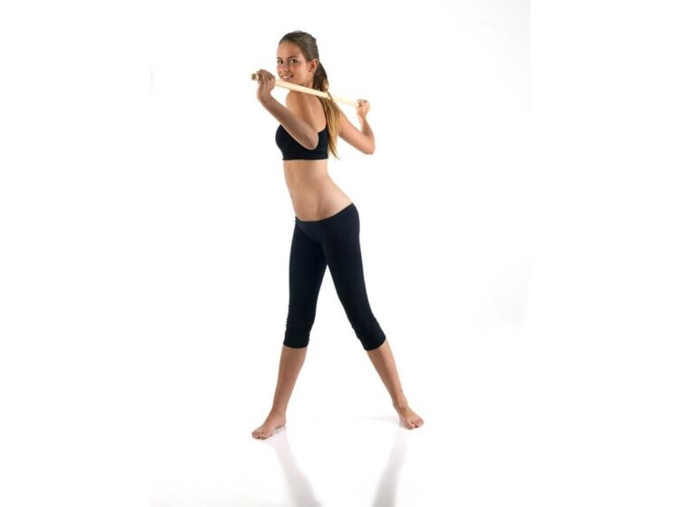 Stick exercise to strengthen and develop back muscles with thoracic osteochondrosis